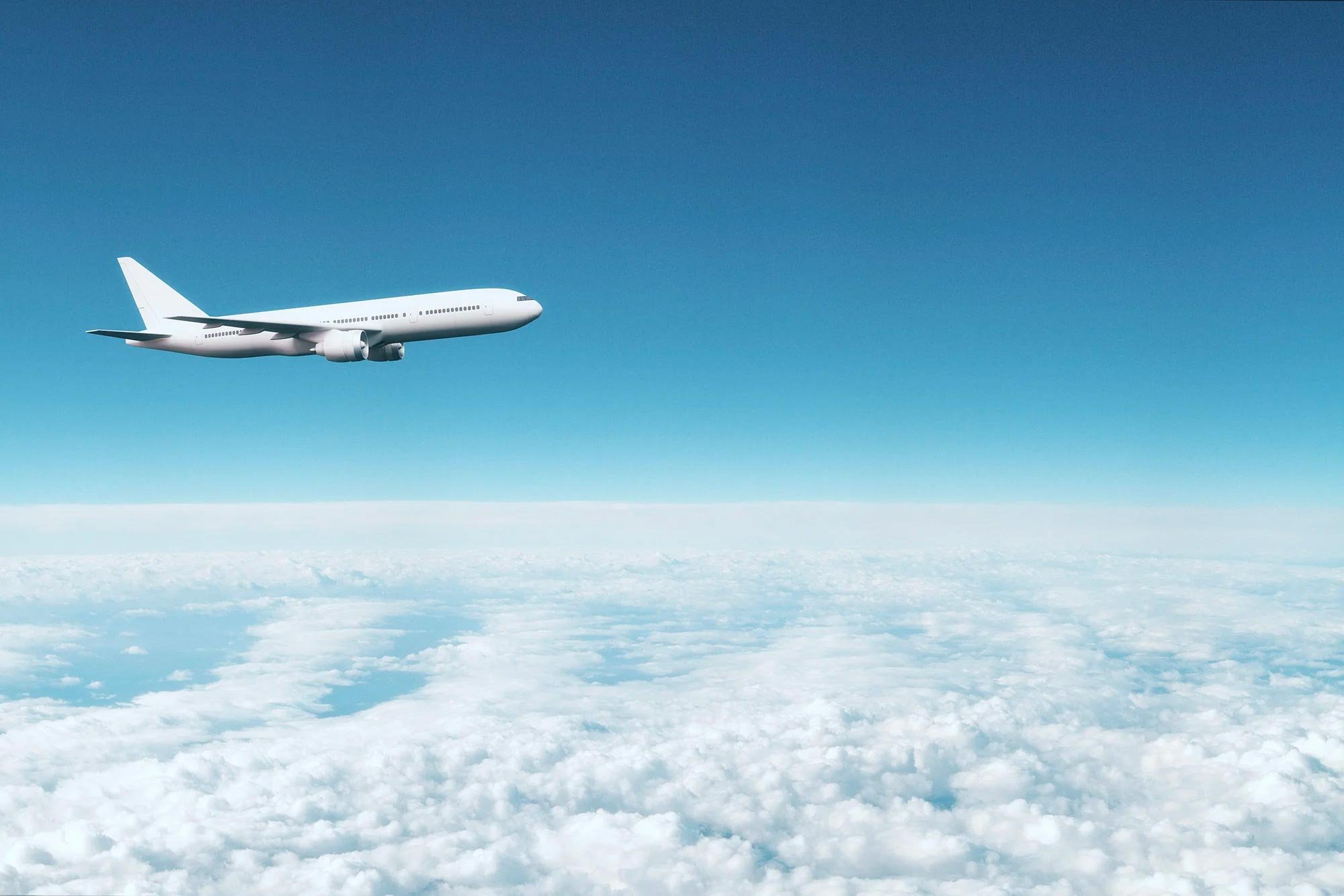 An airplane against a blue sky