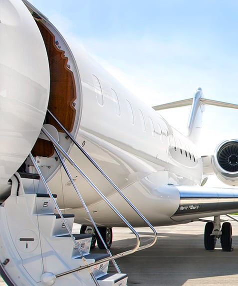 stairs leading into a private jet
